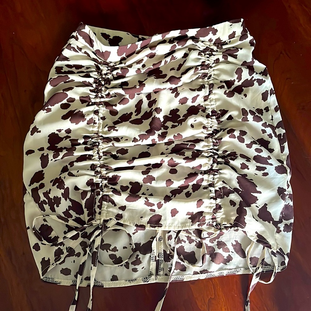 Nasty Gal ruched cow print adjustable length mini skirt size US 2